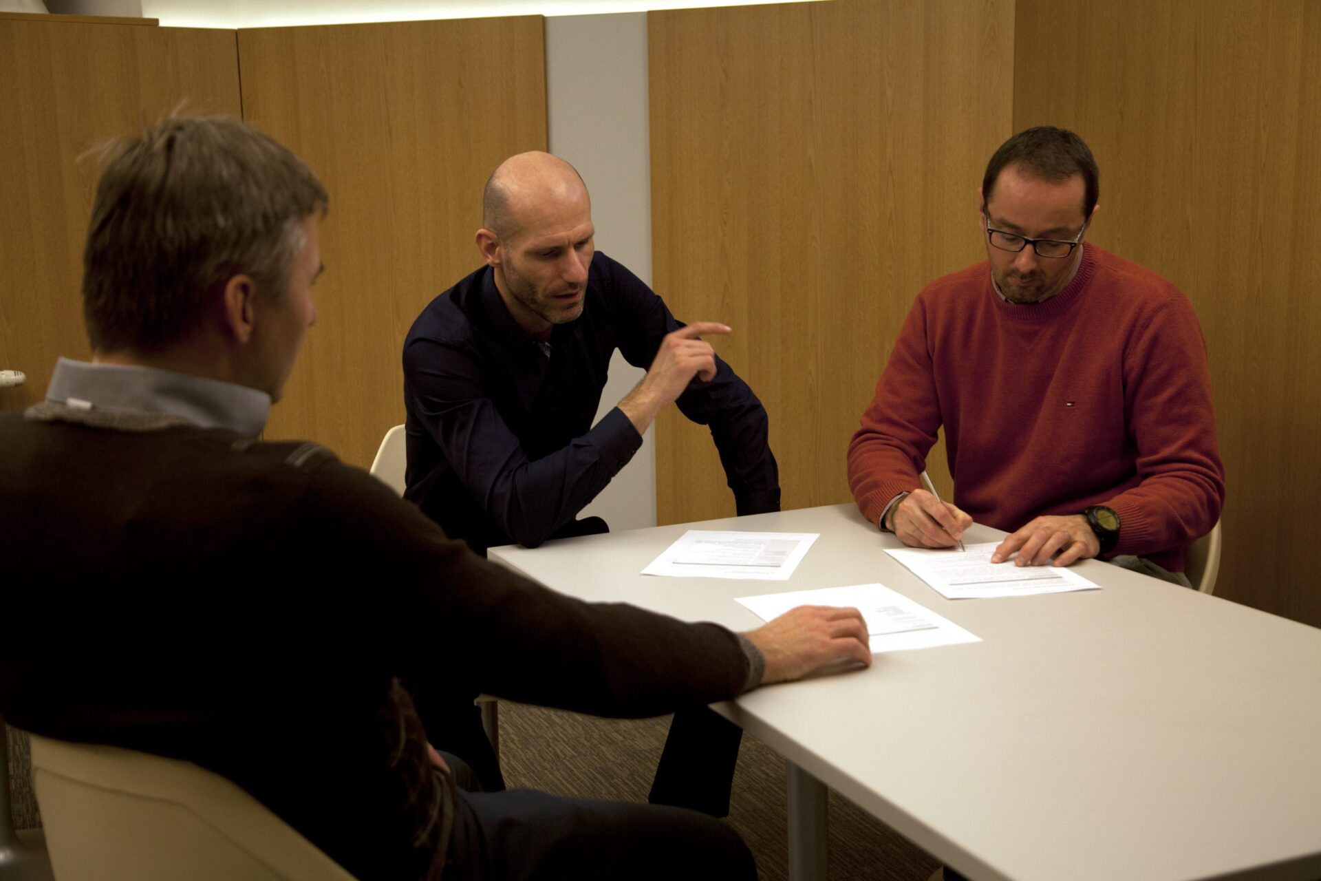 Three people during assesment and development